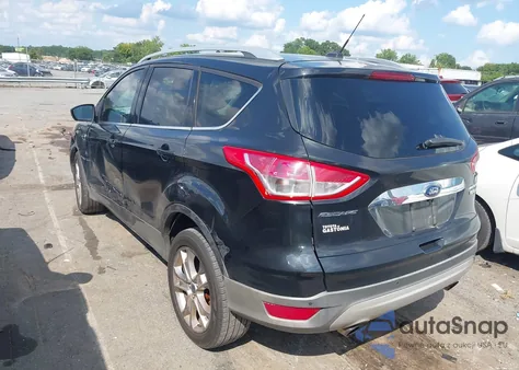 2014 Ford Escape Titanium z USA, uszkodzony, nr VIN 1FMCU0J97EUB49449